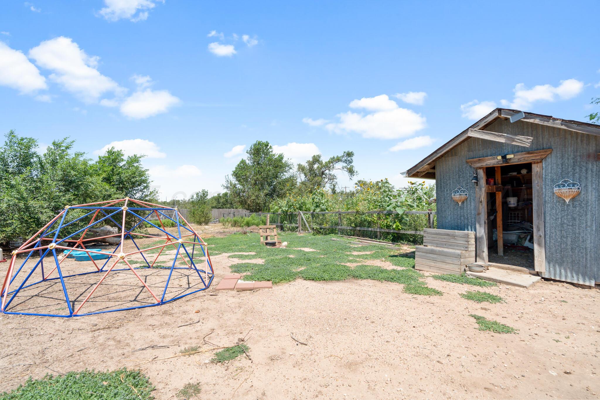 5211 River Road Amarillo, TX 79108 - Photo 30 of 39 a view of a backyard