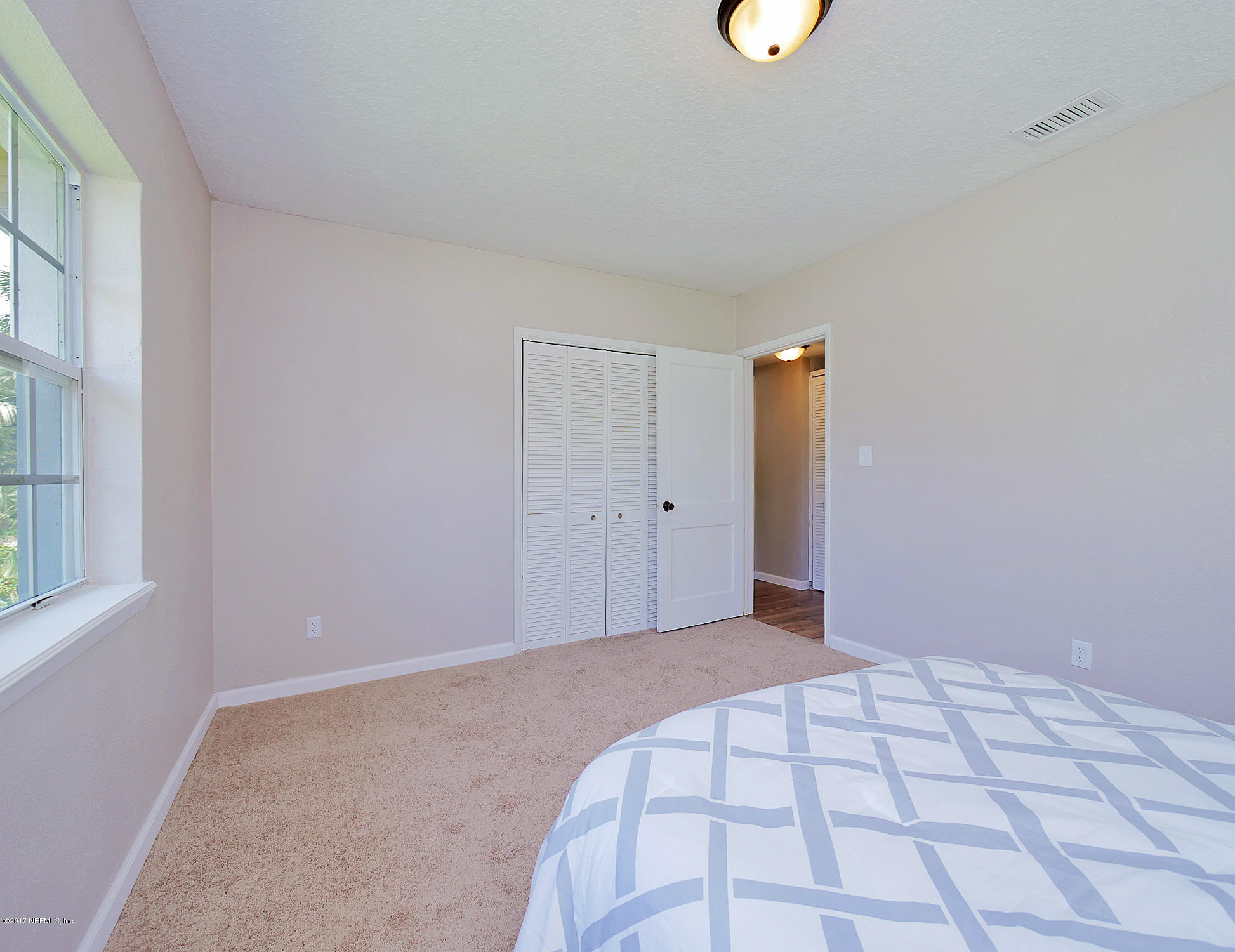 2448 Clemson Road Jacksonville, FL 32217 - Photo 12 of 21 a view of an empty room