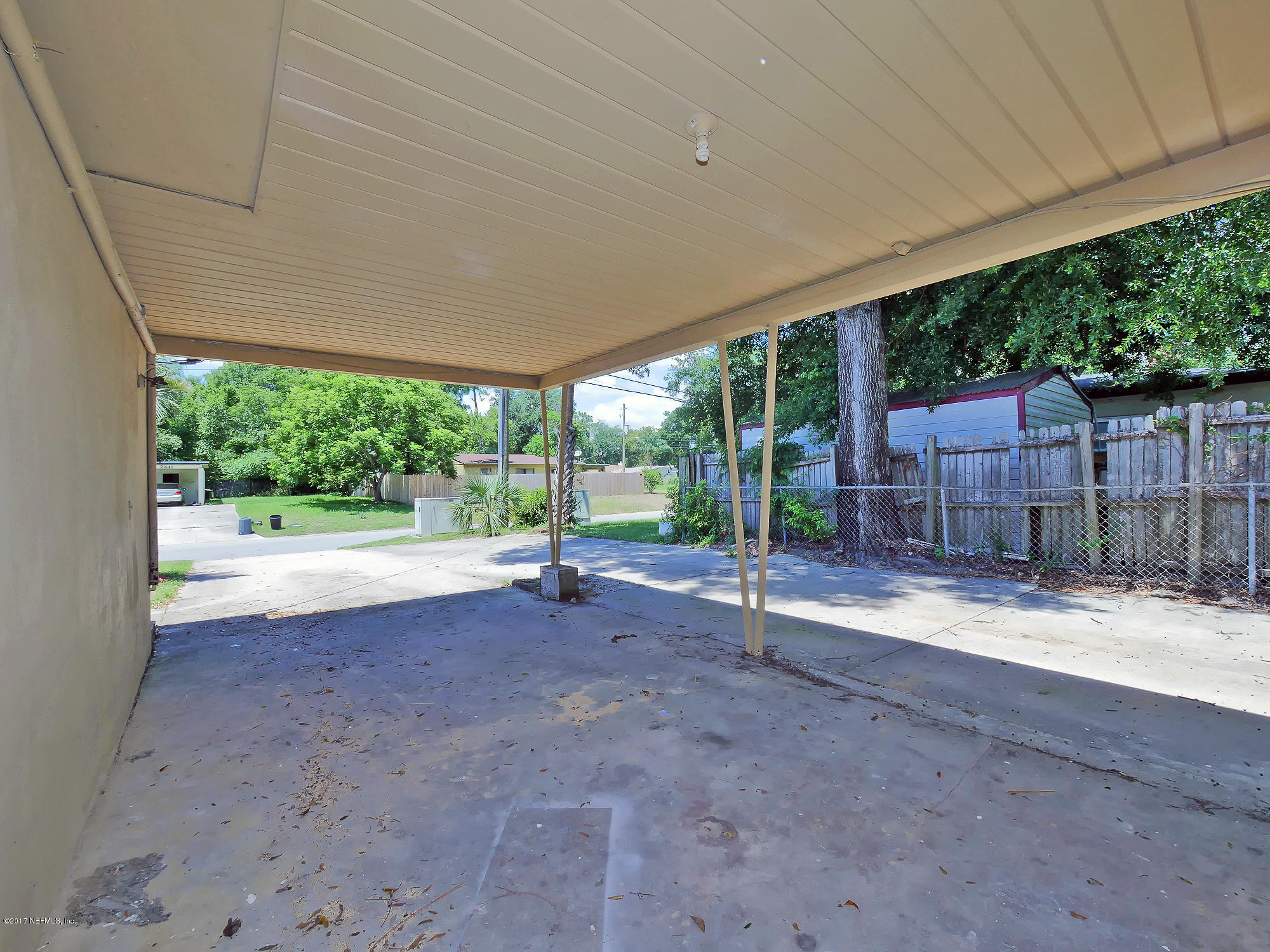 2448 Clemson Road Jacksonville, FL 32217 - Photo 21 of 21 a view of a house with backyard and a backyard
