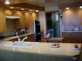 6460 Fort Road Toppenish, WA 98948 - Photo 5 of 5 a kitchen with a sink and cabinets