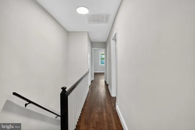 a kitchen with stainless steel appliances granite countertop a stove and a refrigerator