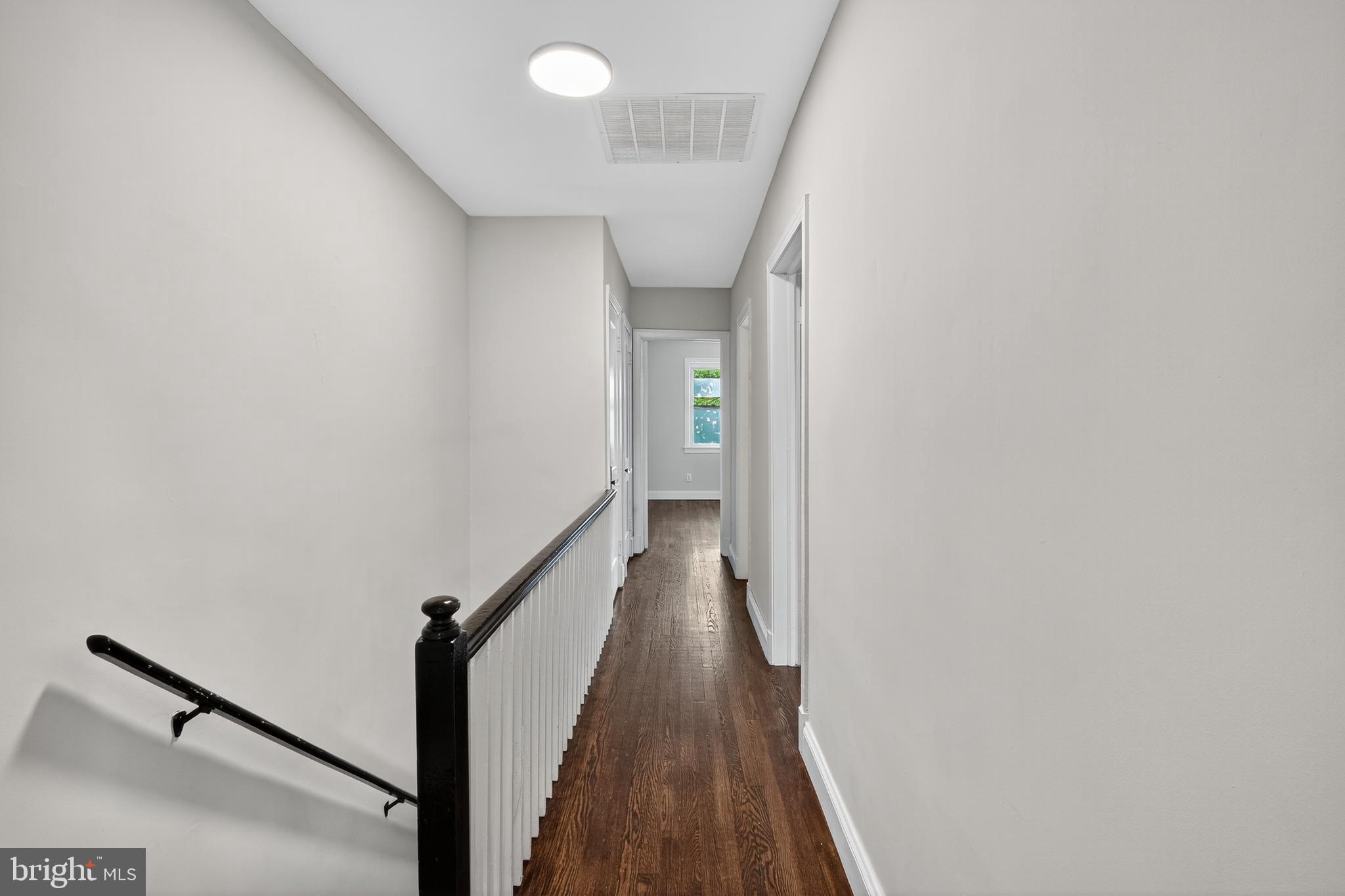 5221 2nd Street Northwest Washington, DC 20011 - Photo 13 of 39 a view of a hallway with wooden floor