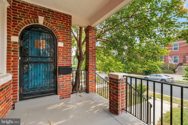 a view of entrance gate of a house