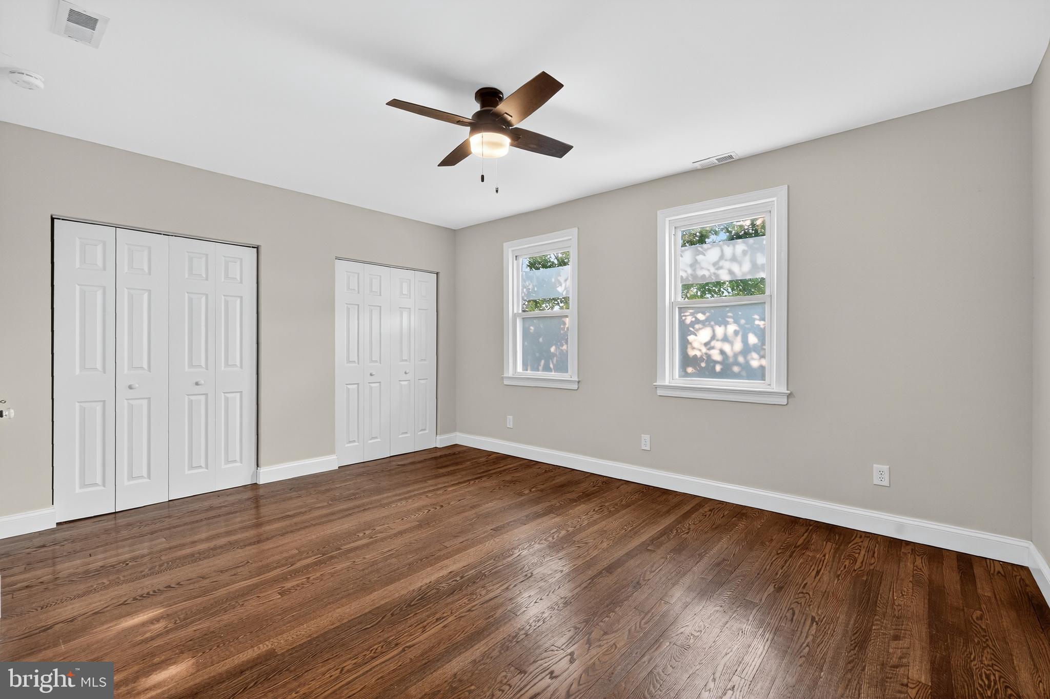 5221 2nd Street Northwest Washington, DC 20011 - Photo 19 of 39 a view of empty room with wooden floor and fan