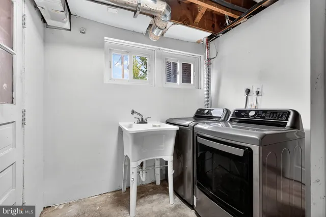 a view of a room with wooden walls