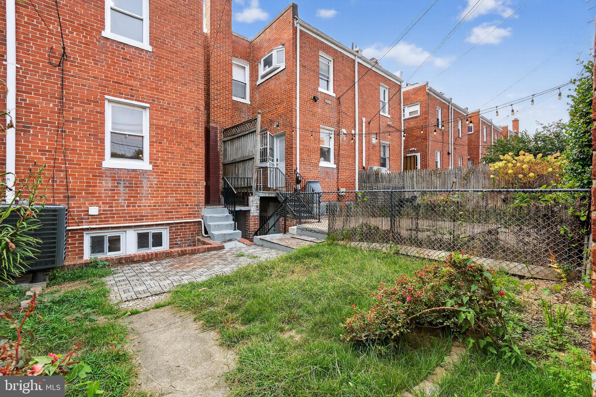 5221 2nd Street Northwest Washington, DC 20011 - Photo 33 of 39 a view of a building with a yard