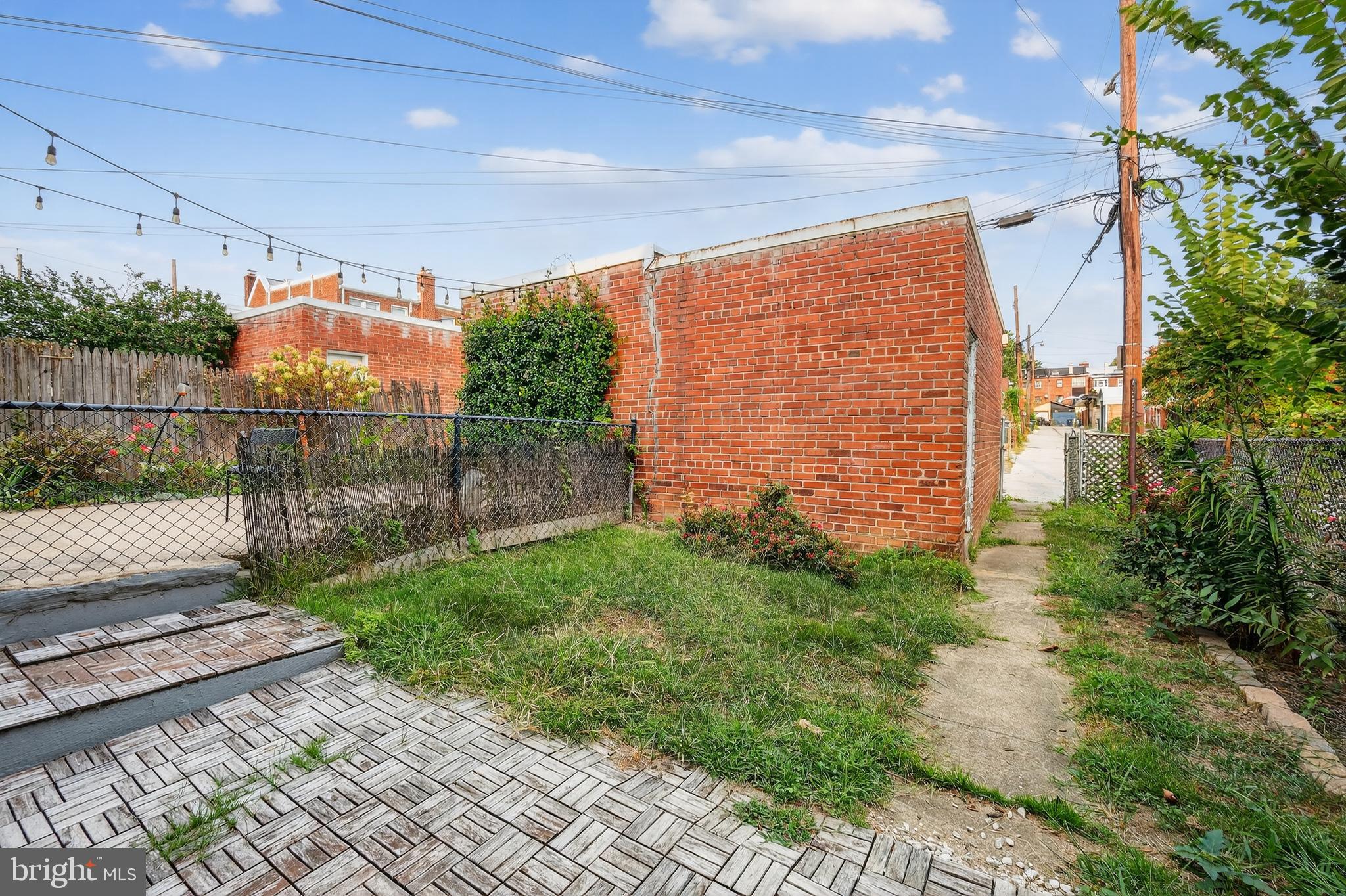 5221 2nd Street Northwest Washington, DC 20011 - Photo 34 of 39 a view of a pathway with a wrought fence