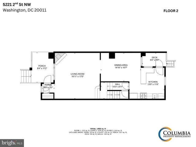 a view of a pathway with a wrought fence