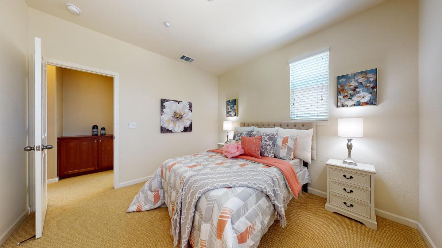 5300 Fioli Loop San Ramon, CA 94582 - Photo 24 of 38 a bed room with a bed and a dresser