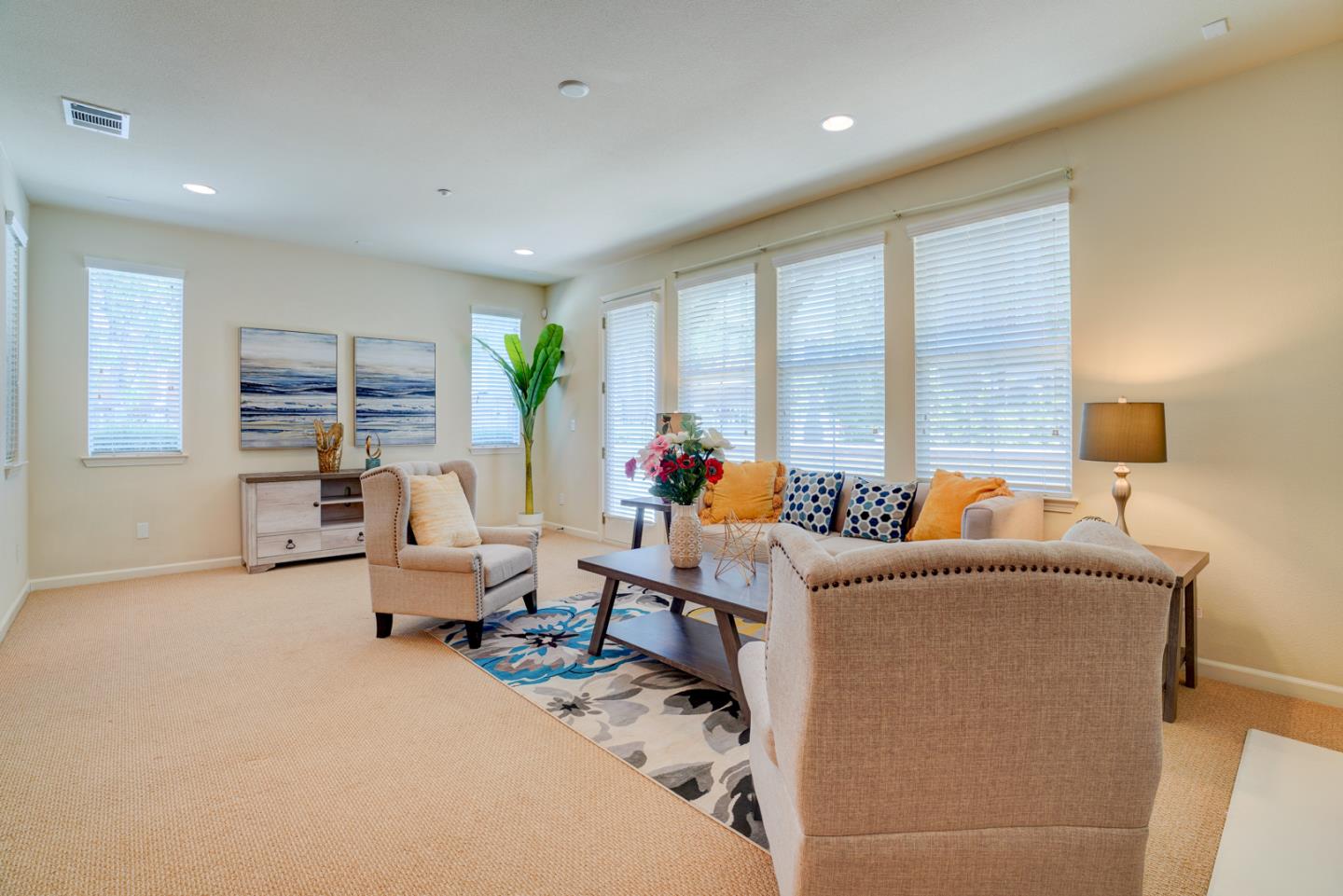 5300 Fioli Loop San Ramon, CA 94582 - Photo 6 of 38 a living room with furniture and a flat screen tv