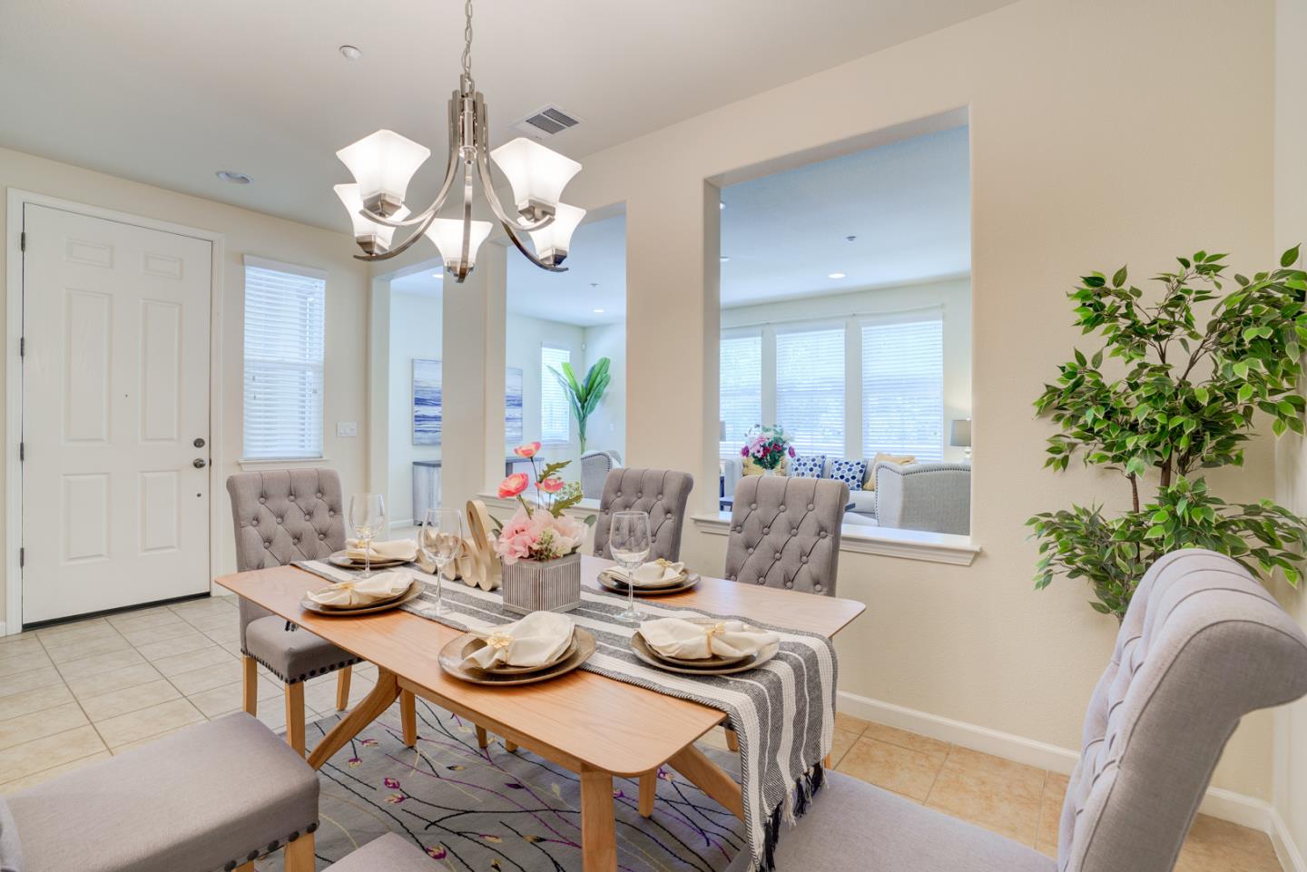 5300 Fioli Loop San Ramon, CA 94582 - Photo 10 of 38 a view of a dining room with furniture and chandelier