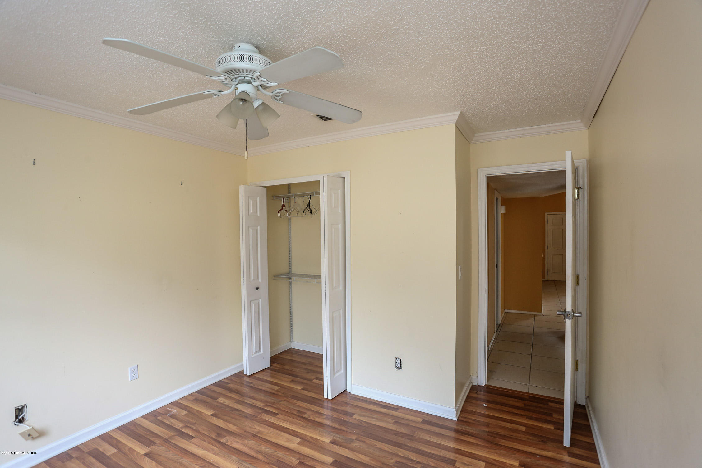 3165 Kings Road St. Augustine, FL 32086 - Photo 11 of 15 a view of an empty room with wooden floor