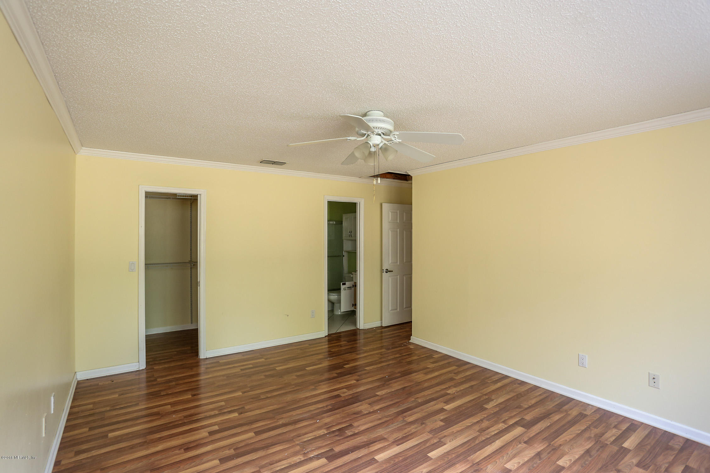 3165 Kings Road St. Augustine, FL 32086 - Photo 13 of 15 a view of an empty room with wooden floor