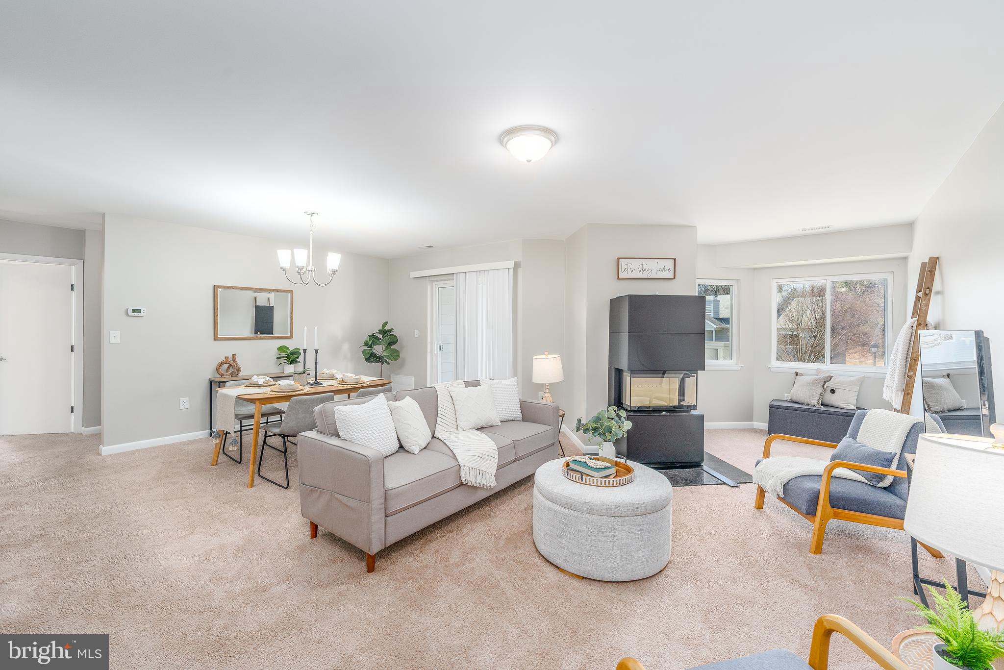 2213 Lowells Glen Road, Unit L Baltimore, MD 21234 - Photo 3 of 26 a living room with furniture and a table