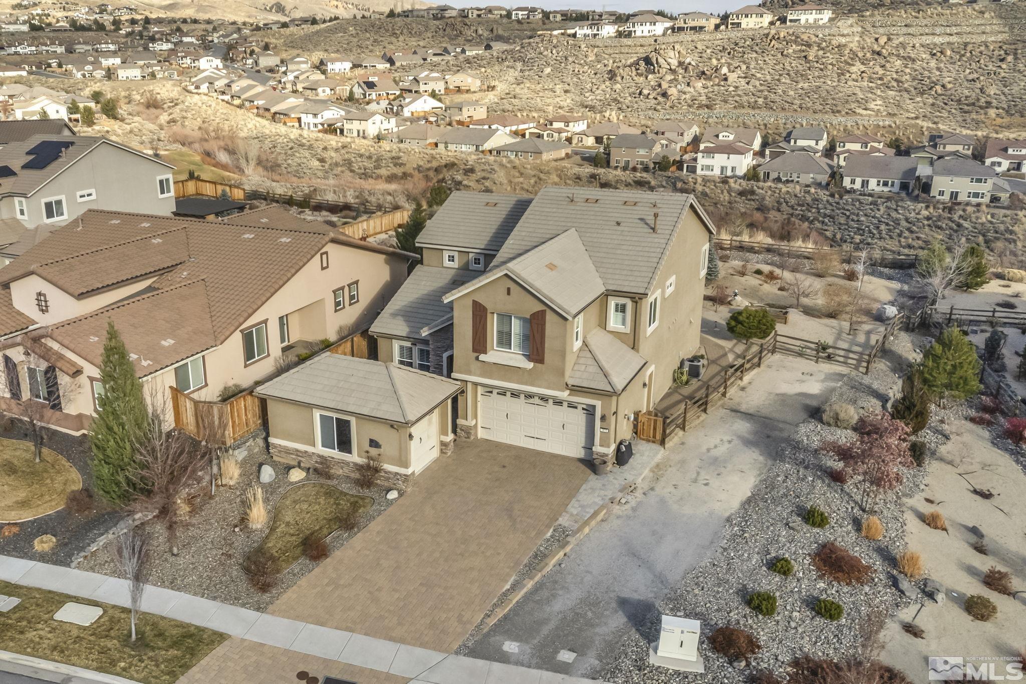 1610 Elk Run Trail Reno, NV 89523 - Photo 2 of 33 an aerial view of residential houses with outdoor space