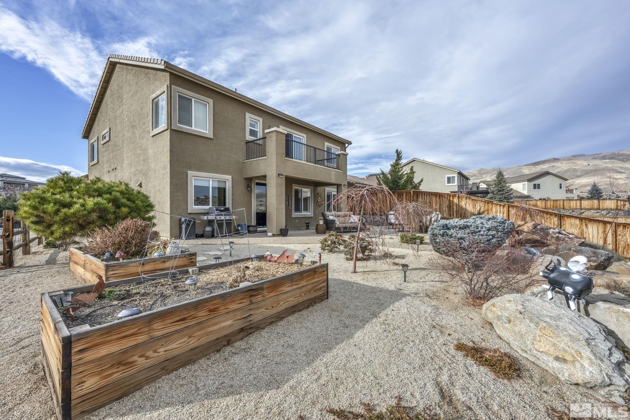 1610 Elk Run Trail Reno, NV 89523 - Photo 30 of 33 a view of a house with swimming pool and sitting area