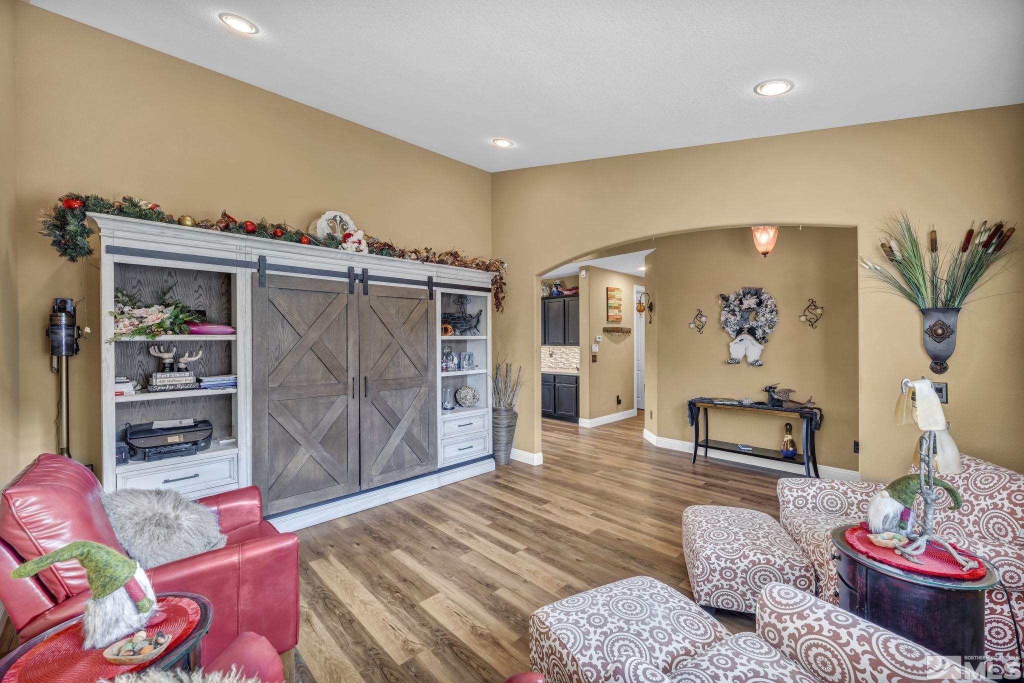 1610 Elk Run Trail Reno, NV 89523 - Photo 8 of 33 a bedroom with furniture and a wooden floor