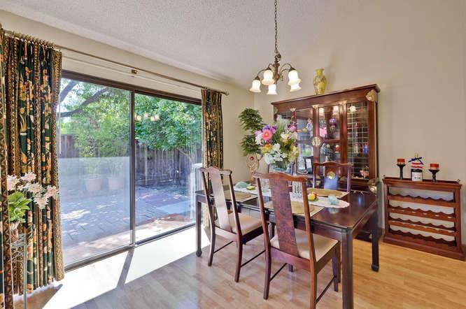 1064 Dempsey Road Milpitas, CA 95035 - Photo 12 of 39 a view of a dining room with furniture window and wooden floor