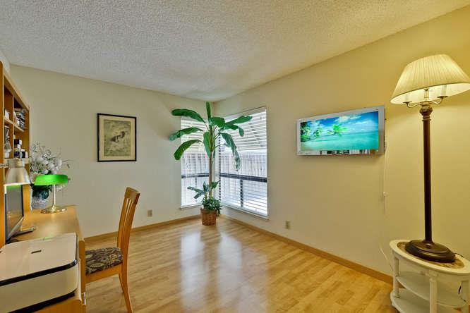 1064 Dempsey Road Milpitas, CA 95035 - Photo 18 of 39 a view of a livingroom with furniture and a potted plant