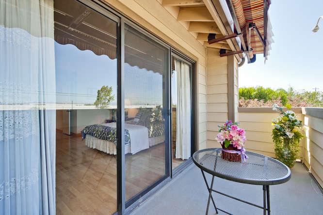1064 Dempsey Road Milpitas, CA 95035 - Photo 26 of 39 a dining room with furniture and a potted plant