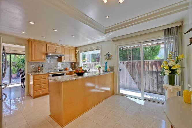 1064 Dempsey Road Milpitas, CA 95035 - Photo 3 of 39 a large kitchen with lots of counter top space and stainless steel appliances