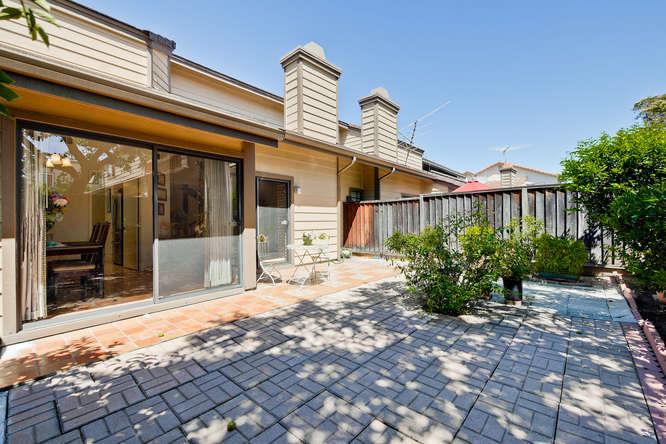 1064 Dempsey Road Milpitas, CA 95035 - Photo 35 of 39 a view of a house with a yard