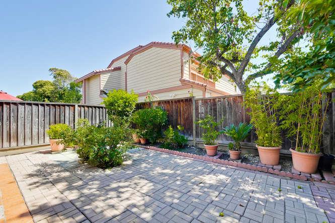1064 Dempsey Road Milpitas, CA 95035 - Photo 36 of 39 a view of a chair and table in the backyard
