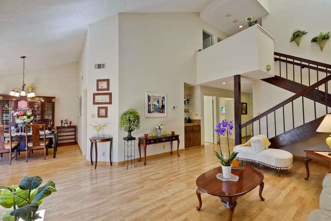 1064 Dempsey Road Milpitas, CA 95035 - Photo 10 of 39 a living room with furniture and a table