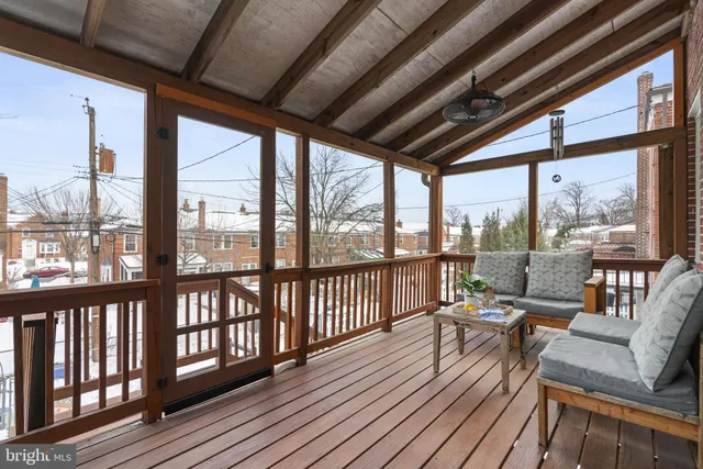a balcony with wooden floor