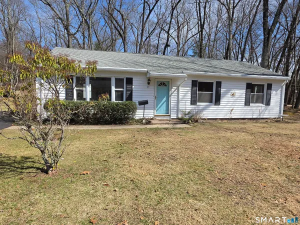 a front view of a house with yard