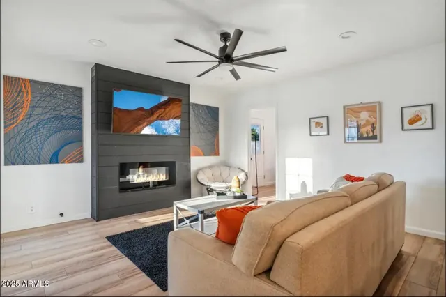 a bedroom with a bed and a fireplace