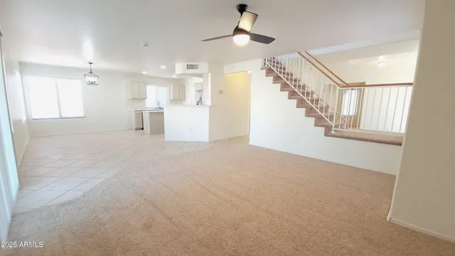 a view of a hallway with stairs
