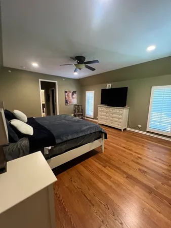 a kitchen with a sink a counter top space and stainless steel appliances