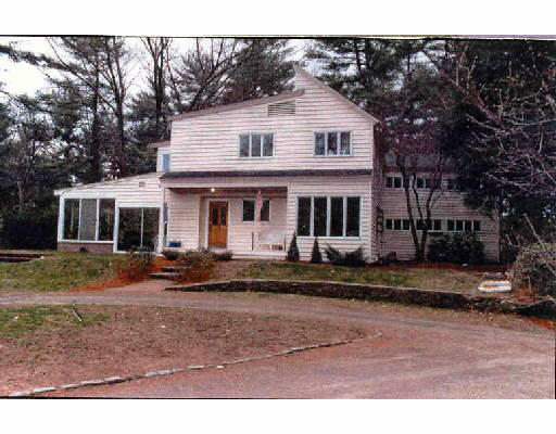 171 Concord Road Wayland, MA 01778 - Photo 1 of 1 a front view of a house with a yard