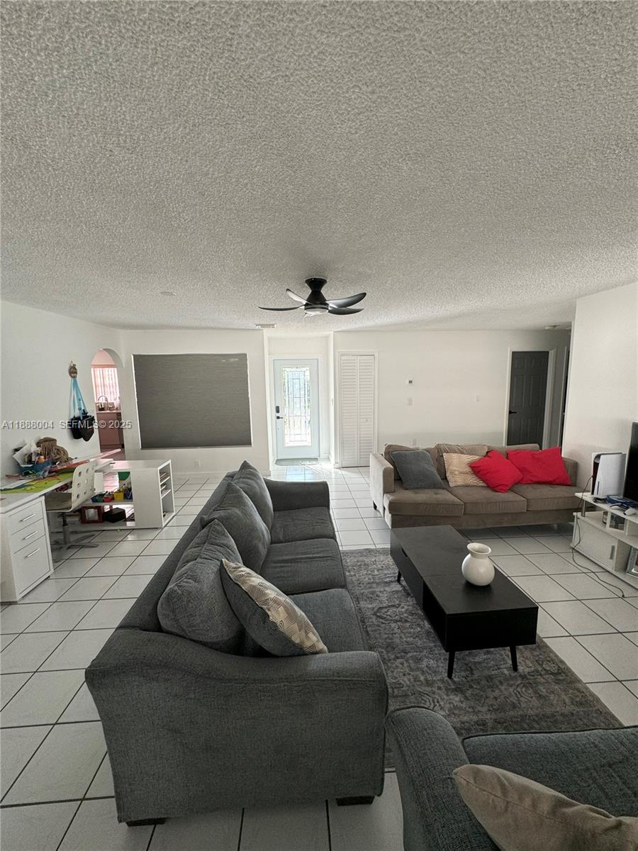 20923 Southwest 126th Court Miami, FL 33177 - Photo 17 of 19 a living room with furniture and a couch
