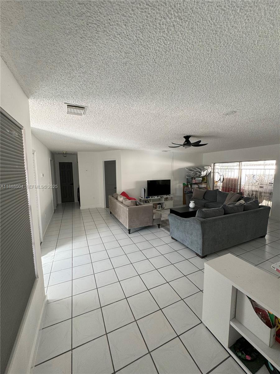 20923 Southwest 126th Court Miami, FL 33177 - Photo 18 of 19 a living room with furniture