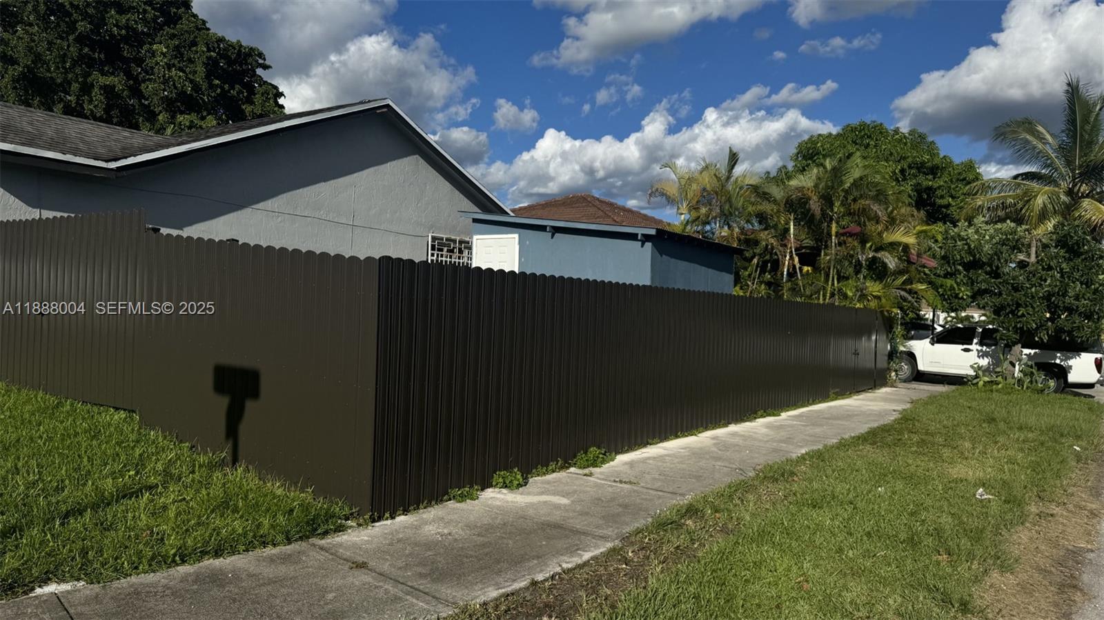 20923 Southwest 126th Court Miami, FL 33177 - Photo 5 of 19 a backyard of a house with lots of green space