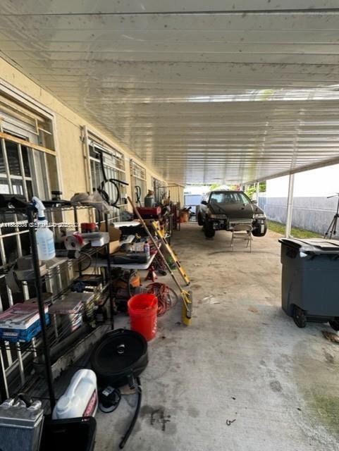 20923 Southwest 126th Court Miami, FL 33177 - Photo 6 of 19 a view of a garage with cars