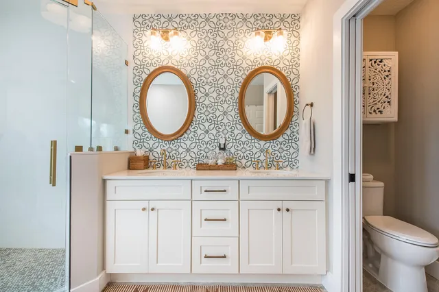 an aerial view of a house with lots of trees