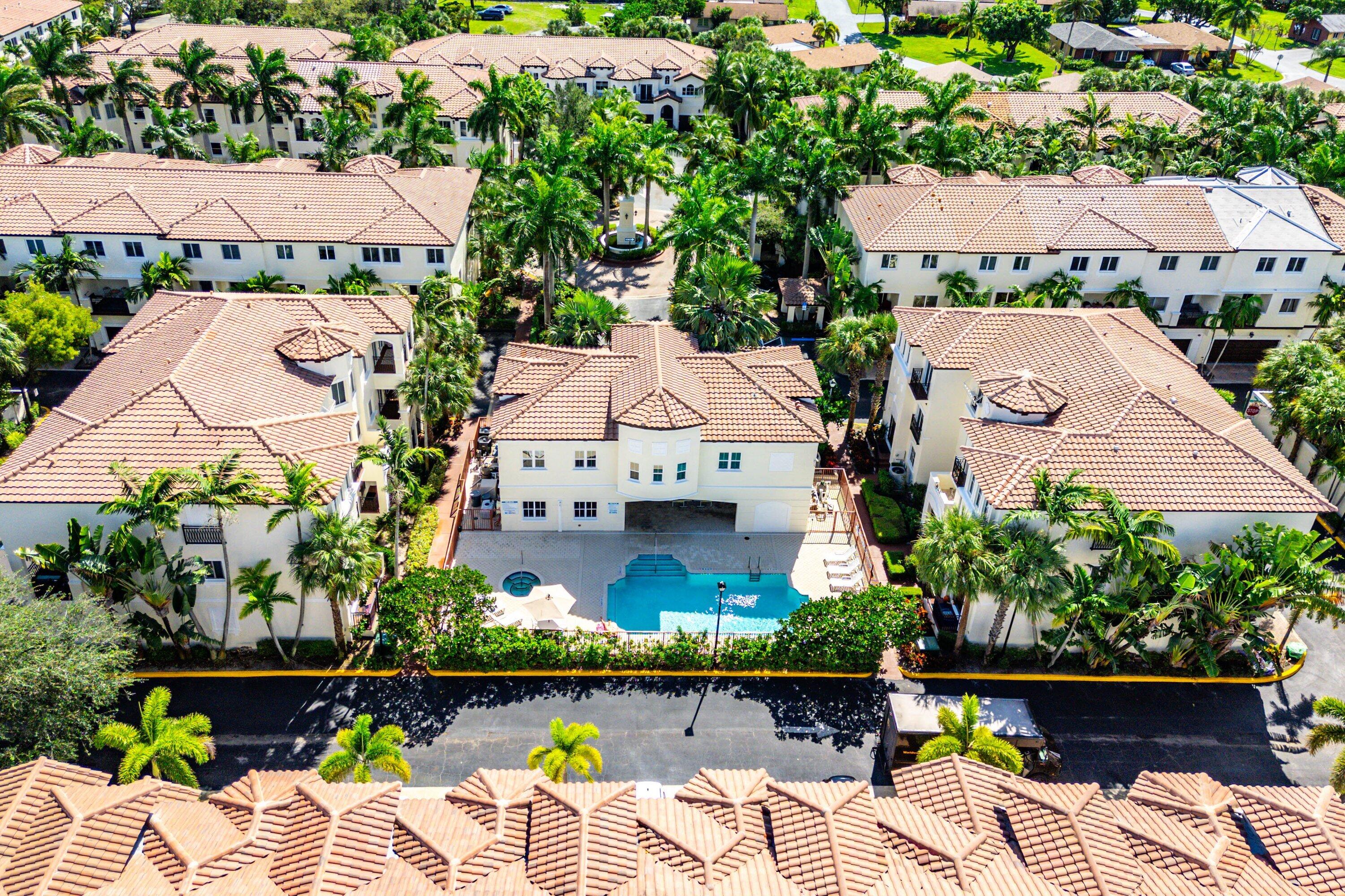 1910 Coastal Bay Boulevard Boynton Beach, FL 33435 - Photo 40 of 64 an aerial view of a house with lots of trees