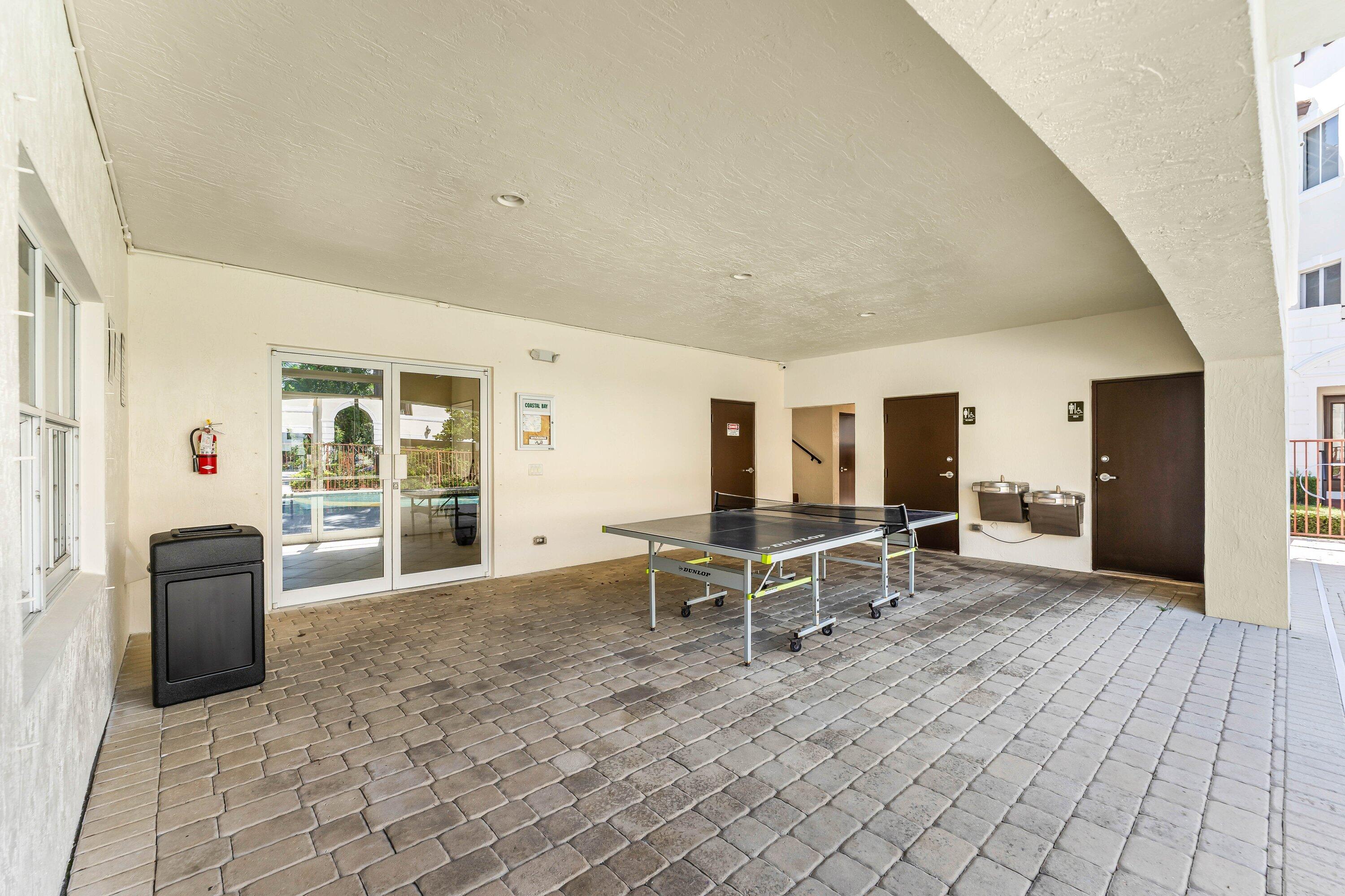 1910 Coastal Bay Boulevard Boynton Beach, FL 33435 - Photo 45 of 64 Clubhouse - Ping Pong Table/Restrooms