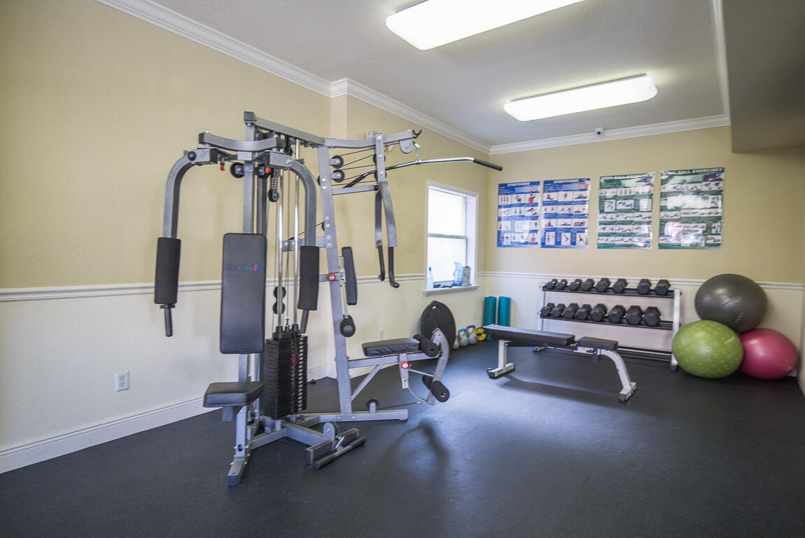 1910 Coastal Bay Boulevard Boynton Beach, FL 33435 - Photo 47 of 64 a view of a room with gym equipment