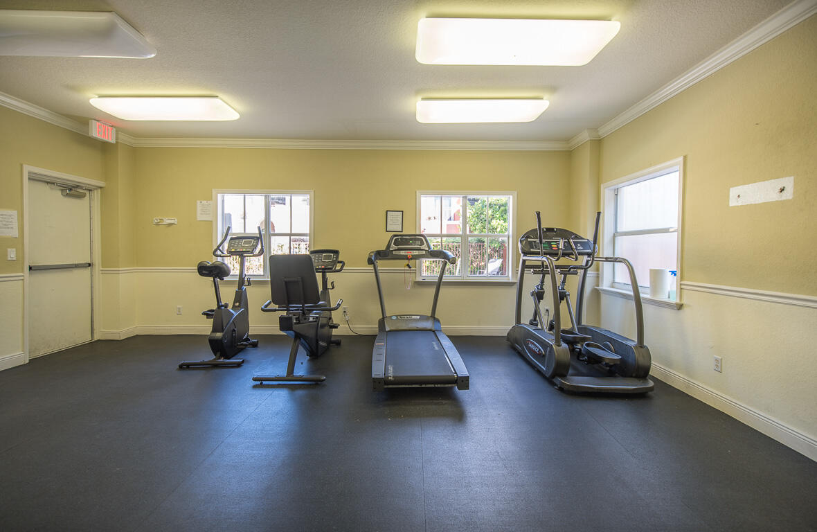 1910 Coastal Bay Boulevard Boynton Beach, FL 33435 - Photo 48 of 64 a view of a room with gym equipment