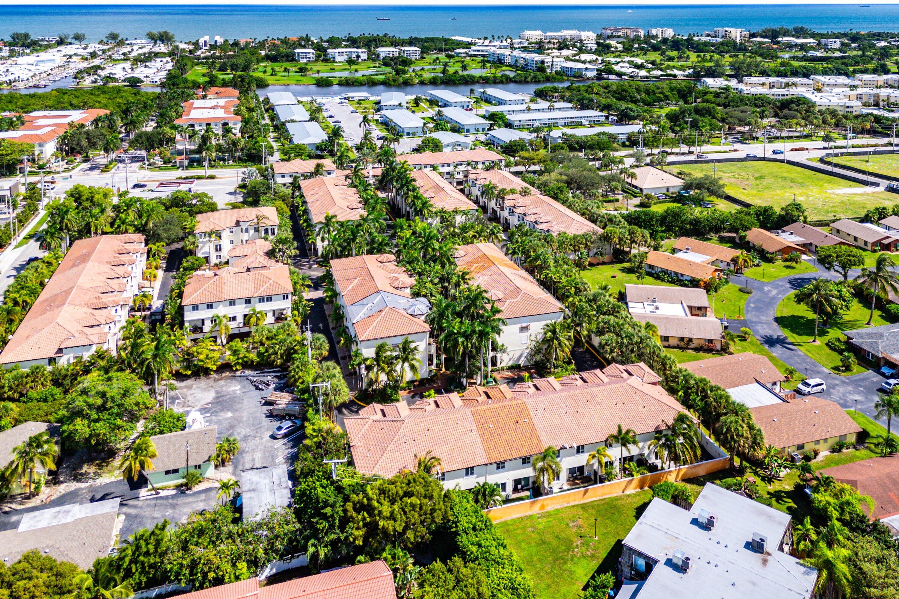 1910 Coastal Bay Boulevard Boynton Beach, FL 33435 - Photo 53 of 64 an aerial view of residential houses with outdoor space