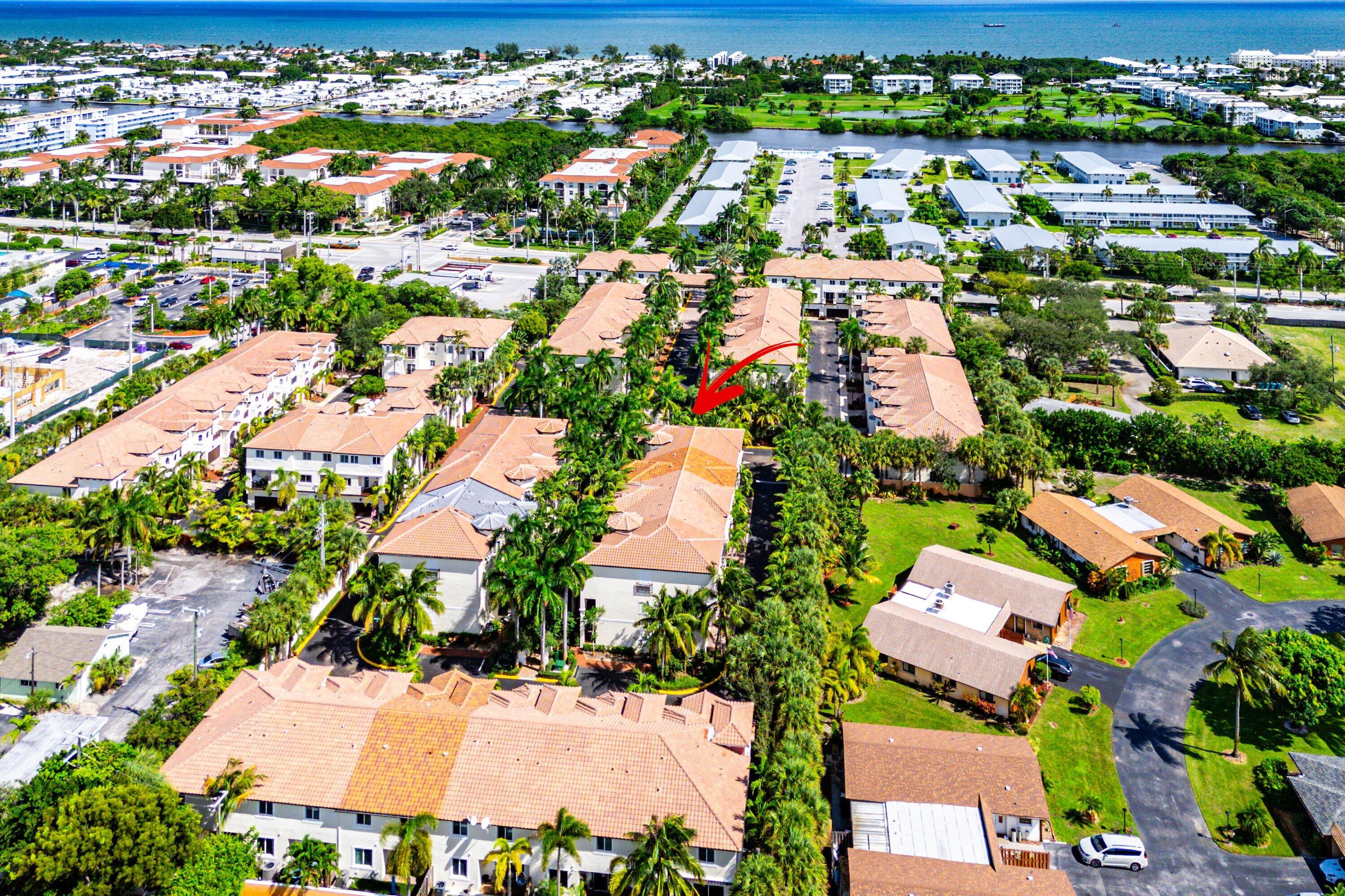 1910 Coastal Bay Boulevard Boynton Beach, FL 33435 - Photo 56 of 64 an aerial view of residential houses with outdoor space