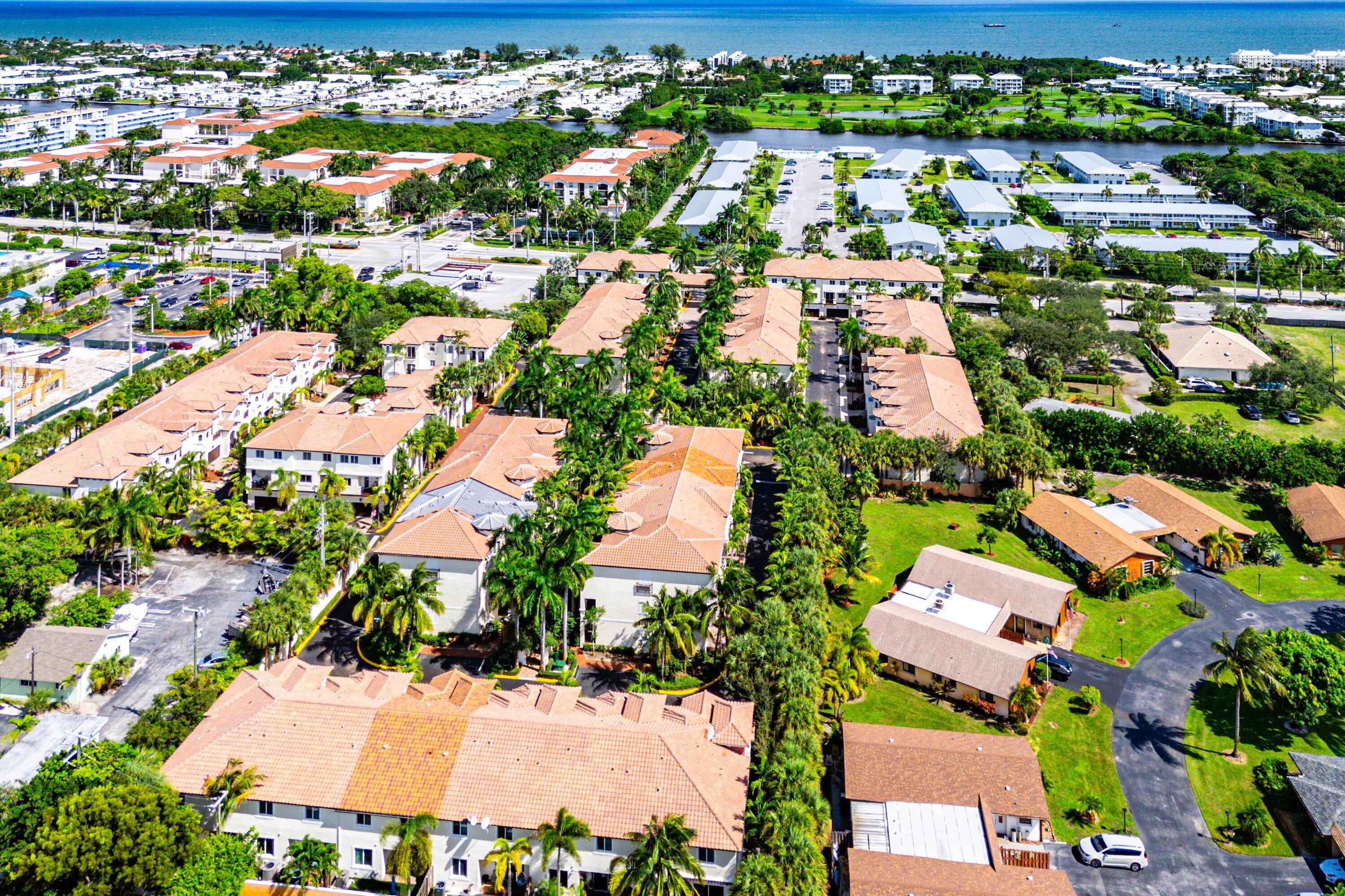 1910 Coastal Bay Boulevard Boynton Beach, FL 33435 - Photo 57 of 64 an aerial view of residential houses with outdoor space