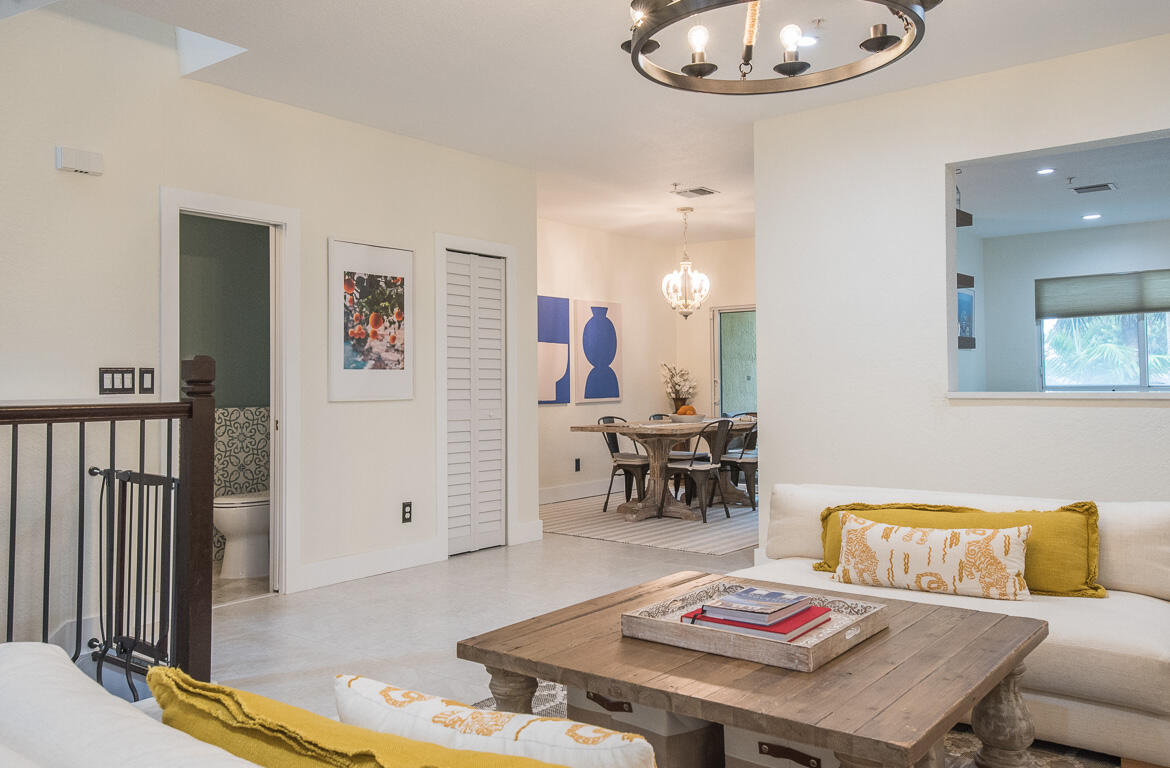 1910 Coastal Bay Boulevard Boynton Beach, FL 33435 - Photo 6 of 64 a living room with furniture and a table