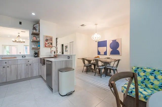 a view of living room with granite countertop furniture and a fireplace