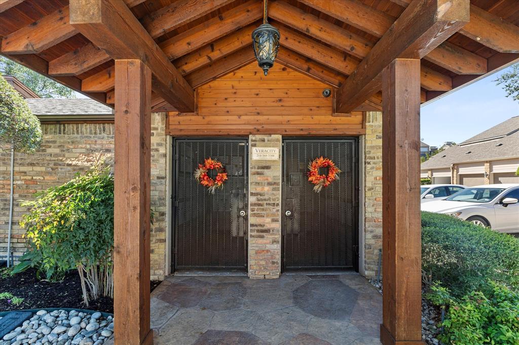 5616 Preston Oaks Road, Unit 208 Dallas, TX 75254 - Photo 13 of 16 a view of a porch with a door