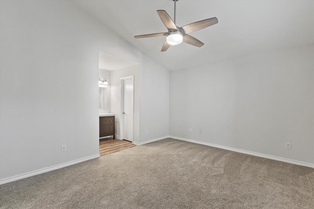 5616 Preston Oaks Road, Unit 208 Dallas, TX 75254 - Photo 4 of 16 an empty room with fan